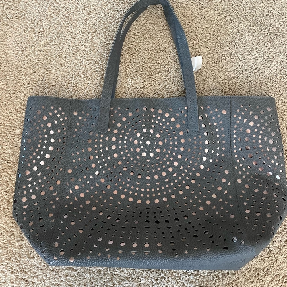 Women’s bag.  NWT.  Approximately 20 inches x 12 inches.